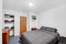 Bedroom featuring a closet and carpet flooring