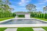 Swimming pool with a yard and an outdoor structure