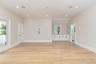 Unfurnished living room featuring light wood finished floors and recessed lighting