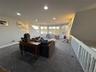 Spacious loft providing extra living space.