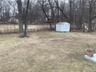 View of yard featuring a shed