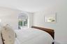 Bedroom featuring baseboards