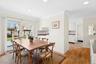 Dining area featuring light wood-style floors, ornamental molding, and recessed lighting