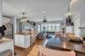 Dining area featuring light wood finished floors and recessed lighting
