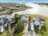 Aerial view of residential area with a large body of water