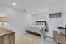 Bedroom with recessed lighting and crown molding