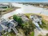 Aerial view of residential area with a nearby body of water