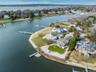 Aerial view of residential area with a nearby body of water