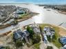 Aerial view of residential area with a large body of water