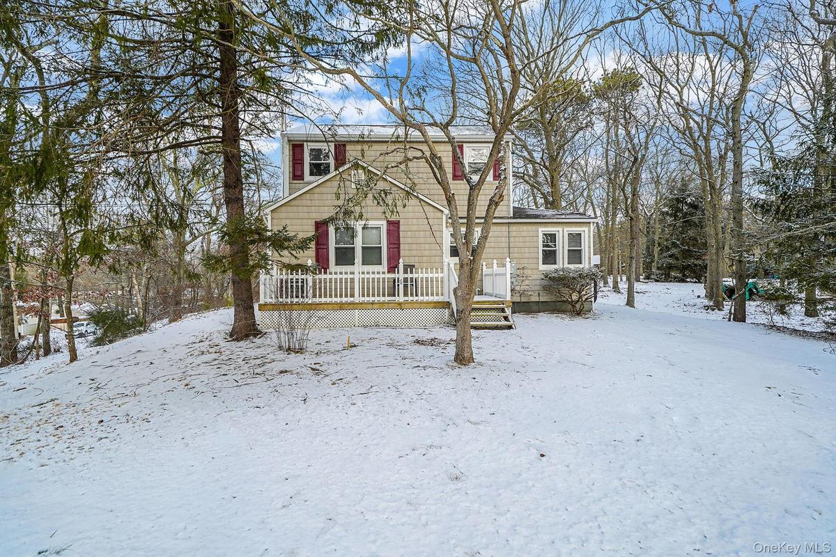 View of front of home featuring a deck