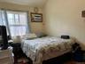 Bedroom with vaulted ceiling