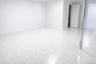 Empty room featuring baseboards