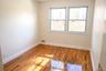 Empty room with light wood-style flooring