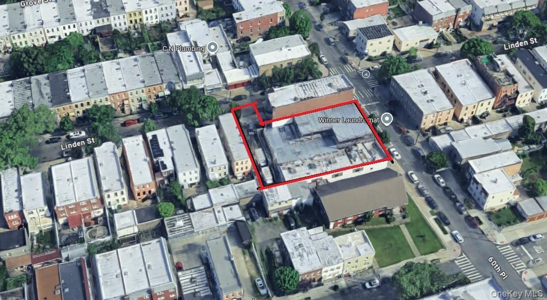 Aerial view of property's location featuring property parcel outlined