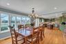 Dining space with recessed lighting, a chandelier, crown molding, and light wood-style floors