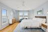 Bedroom featuring light wood finished floors and ceiling fan