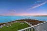 Water view with a fenced backyard