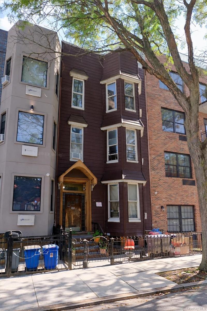 View of front of home with a fenced front yard