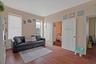Living room featuring wood finished floors and baseboards