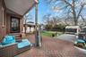 View of patio / terrace with a gazebo, a playground, area for grilling, an outdoor living space, and entry steps