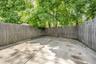 Fenced backyard featuring a patio area