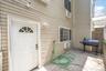 Doorway to property with a patio area