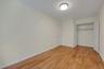 Unfurnished bedroom with light wood-type flooring and a closet