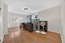Bedroom featuring light wood finished floors and baseboards