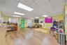 Rec room featuring wood finished floors and a paneled ceiling