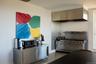Kitchen featuring ventilation hood and stainless steel appliances