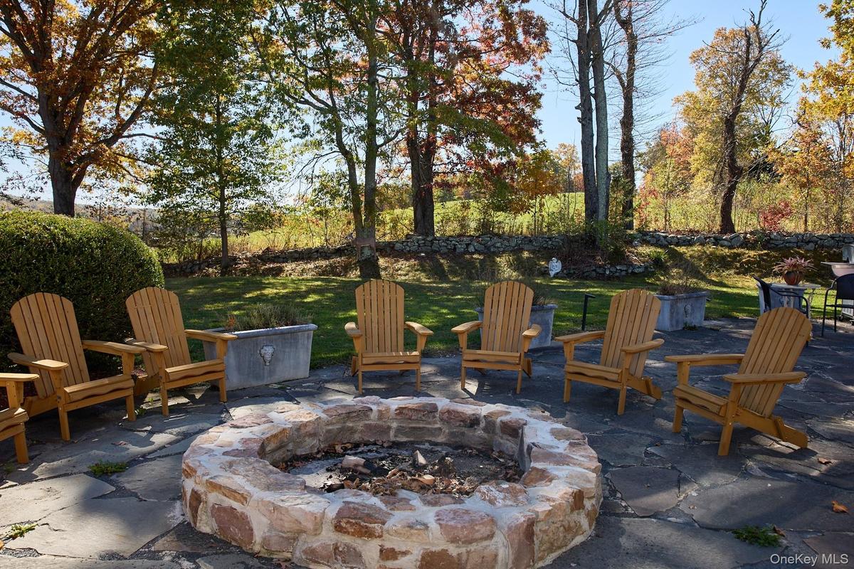 View of patio / terrace with a fire pit