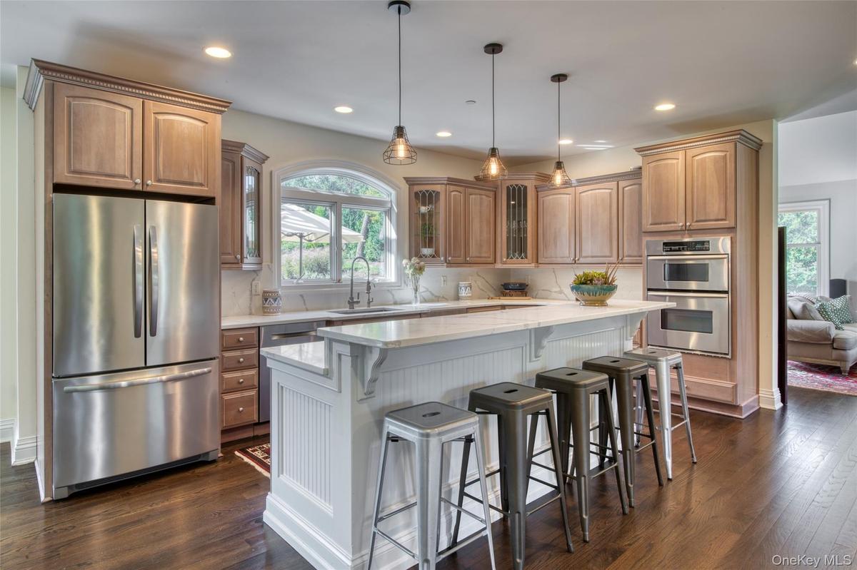 Perfect for entertaining, adjacent to both interior and exterior dining areas