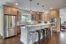 Perfect for entertaining, adjacent to both interior and exterior dining areas