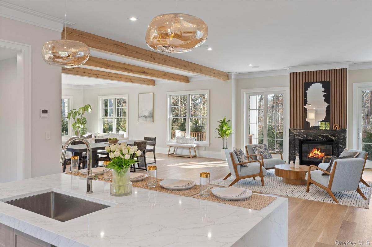 Elegant and functional, the kitchen anchors the home's open concept layout while offering elevated finishes and exceptional performance