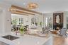 Elegant and functional, the kitchen anchors the home's open concept layout while offering elevated finishes and exceptional performance