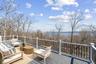 Large deck with Hudson River views virtually staged