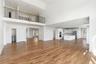 Looking toward the kitchen with 2nd floor landing overlook