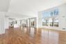 Hardwood floors, cathedral ceilings with deck access and open to Chef's Kitchen