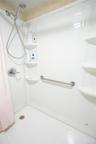 Bathroom with curtained shower