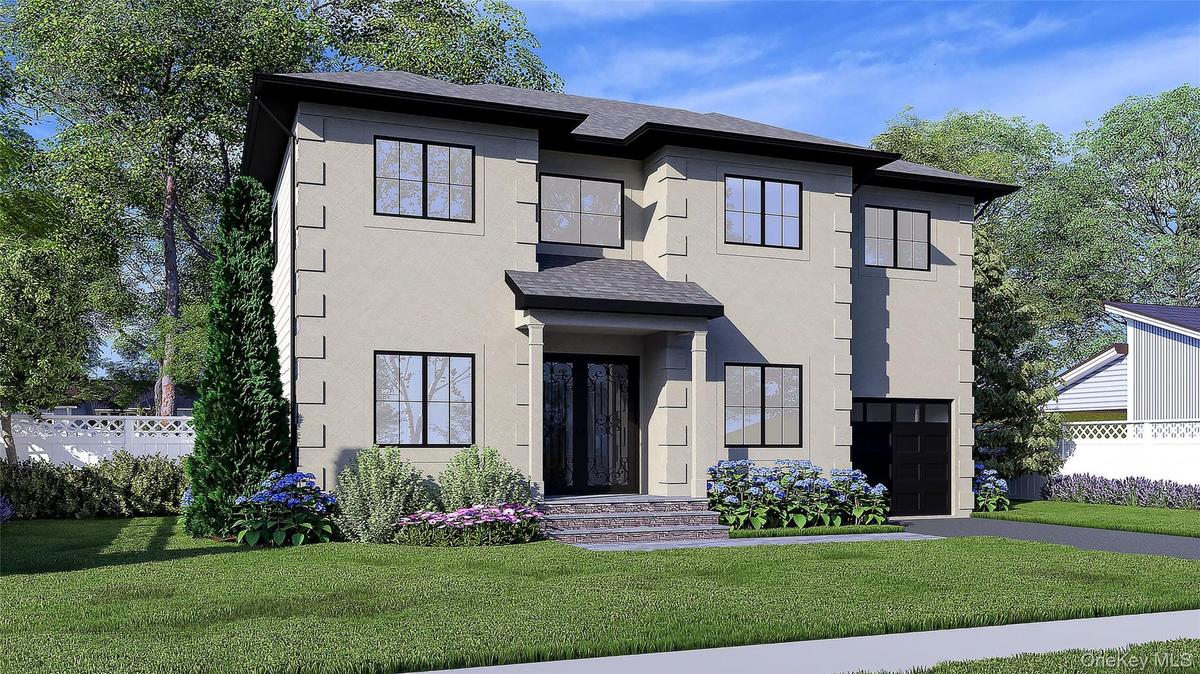 View of front of home featuring roof with shingles, stucco siding, an attached garage, and asphalt driveway