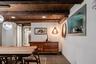 Dining room featuring wooden ceiling with exposed beams, baseboards, tile patterned flooring, and recessed lighting