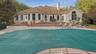 Backyard with in ground heated pool