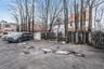 Uncovered parking lot with a residential view