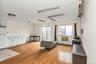 Living area featuring baseboard heating