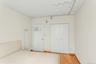 Unfurnished bedroom with a closet and wood-type flooring