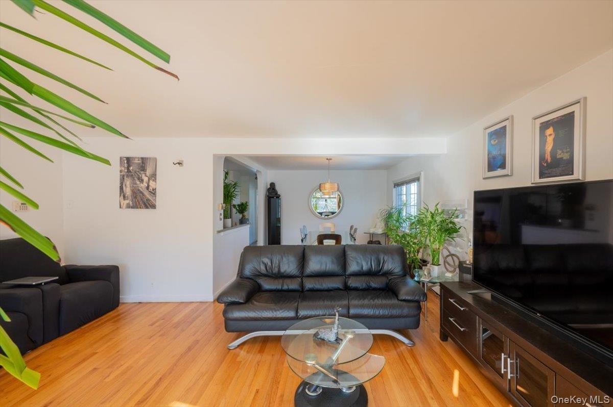 Living room featuring light wood-style floors