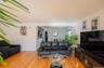 Living room featuring light wood-style floors