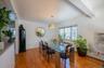 Dining area with light wood-type flooring and baseboard heating