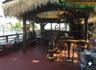 Dock featuring a bar and a deck with water view
