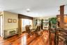 Dining room featuring dark wood-type flooring and recessed lighting